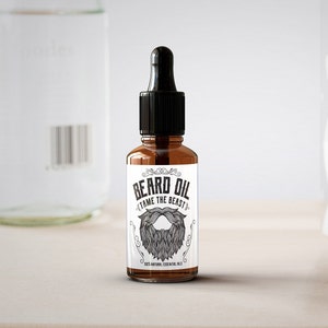 May include: A brown glass bottle with a black dropper top and a white label that reads "Beard Oil Tame the Beast 100% Natural Essential Oils".