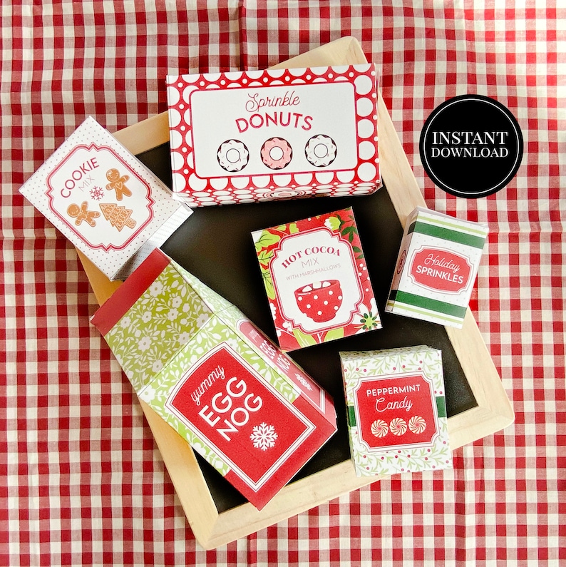 May include: Printable Christmas gift box templates for cookie mix, hot cocoa mix, egg nog, peppermint candy, holiday sprinkles, and sprinkle donuts. The boxes are red, green, and white with festive designs.