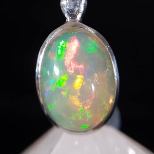 Genuine Ethiopian Welo Opal Sterling Silver Pendant - Iridescent Oval Polished Rainbow Fire - Unique Rainbow Crystal Bag Charm