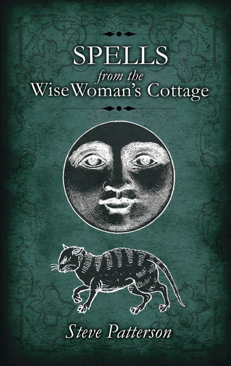 May include: A book cover with a green background and a white title that reads "Spells from the Wise Woman's Cottage". The cover also features a black and white illustration of a moon face and a black and white illustration of a cat.