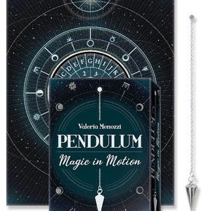 May include: A dark blue box with a silver pendulum hanging from the top. The box has a white circle with the text "PENDULUM Magic in Motion" and the name "Valeria Menozzi" printed on it. The background of the box is a dark blue with a pattern of stars and circles.