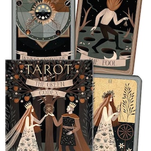 May include: A tarot card deck with four cards visible. The deck is titled "The Green Codex" and features illustrations of figures, trees, and celestial elements. The cards are in shades of green, brown, and gold.