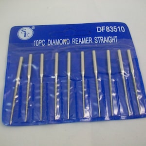 May include: A pack of 10 diamond reamer straight tools, labelled "DF83510 10PC DIAMOND REAMER STRAIGHT" on a blue background.