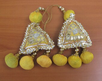 Tassels/ pom pom tassels/ banjara tassels/  decorative tassels/ triangular tassels/ bridal tassels/ yellow tassels.2 pcs.