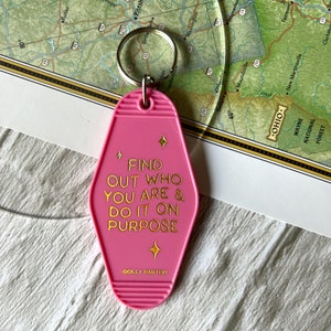 Dolly Parton keychain. Dolly Motel tag. Pace a new road. Be you keychain. Motel keychain. Vintage style