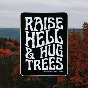 raise hell and hug trees sticker. raise hell sticker. tree hugger sticker.