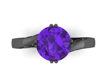 May include: A black ring with a twisted band and a large, round, purple gemstone.