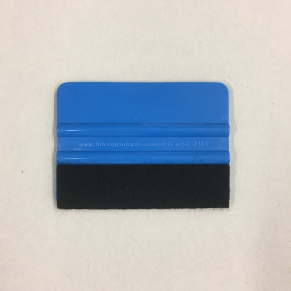 Blue squeegee with felt edge for applying stickers, decals, and