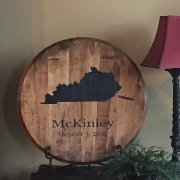 Custom bourbon barrel head with State of Kentucky and Last Name