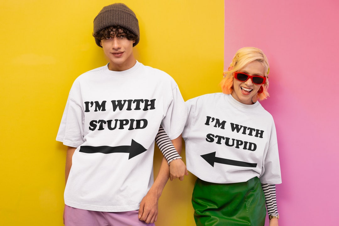 Buy Funny Matching Couple T-shirts: I'm With Stupid Tees (set of 2) Online  in India