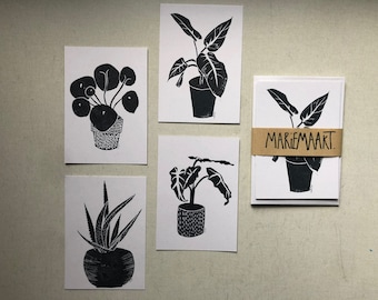 Set of 4 linocut botanical postcards.