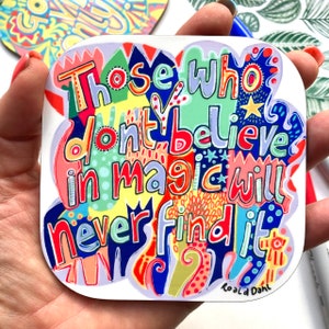 May include: A colorful, hand-drawn quote on a white background. The quote reads "Those who don't believe in magic will never find it." The quote is attributed to Roald Dahl.