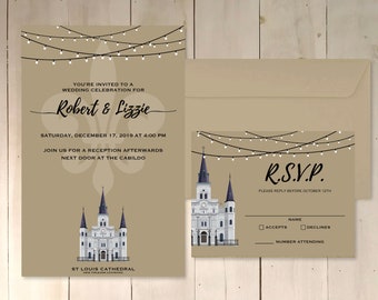 May include: Wedding invitation with a brown background and string lights. The invitation features a drawing of St. Louis Cathedral in New Orleans, Louisiana. The text reads "You're invited to a wedding celebration for Robert & Lizzie. Saturday, December 17, 2019 at 4:00 PM. Join us for a reception afterwards next door at the Cabildo. St. Louis Cathedral, New Orleans, Louisiana."