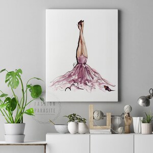 May include: A watercolour painting of a woman in a pink dress with her legs in the air. The dress is flowing and the woman's hair is long and flowing. The painting is on a white background.
