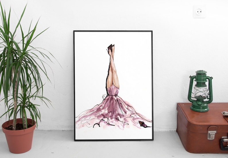 May include: A watercolour illustration of a woman in a pink dress standing on her hands with her legs in the air. The dress is flowing and has a lot of detail. The background is white.