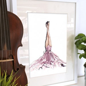 May include: A framed illustration of a woman in a pink gown with her legs in the air. The woman is wearing black heels and there is a small butterfly on the ground.