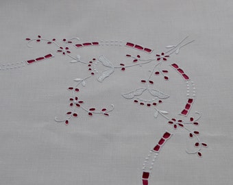 Vintage Irish Linen tablecloth with whitework embroidery and scalloped edge.