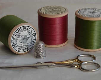 Spool of Campbell's Irish Linen sewing machine thread no 60 Red or Green