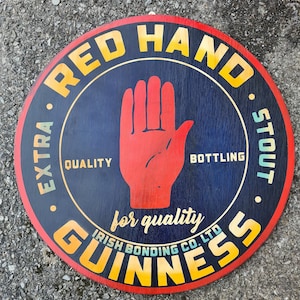 Red hand Guinness pub sign
