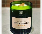 Upcycled Bollinger  Rose champagne bottle filled with pomegranate scented soy wax candle