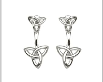 May include: Silver Celtic knot earrings with a double-sided design. The earrings are made of a smooth, polished metal and feature a classic Celtic knot pattern.