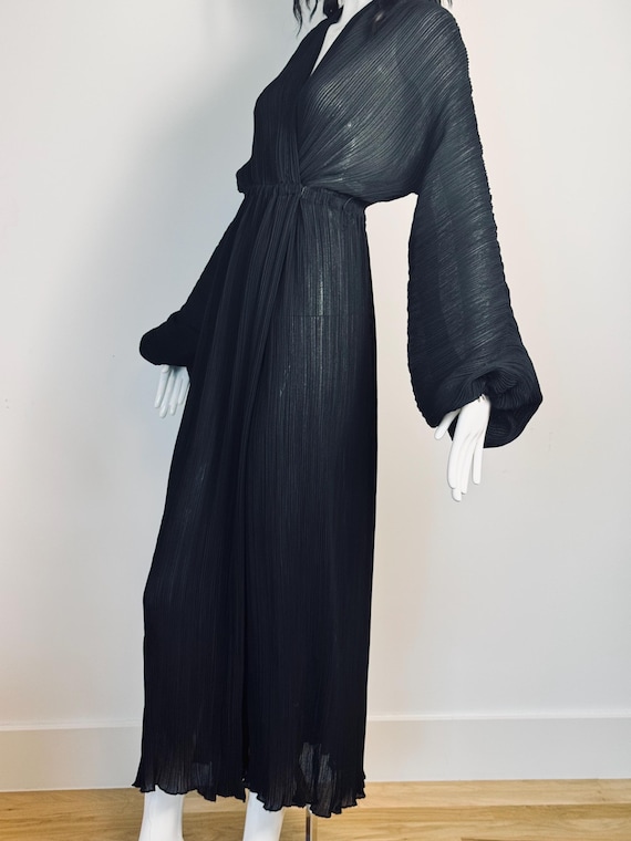 black halston dress 70s IV Dramatic Pleated Wrap Halston’s Asymmetrical Hem Midi