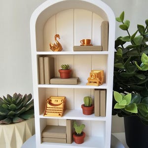 The Gilded Study Miniature Bookshelf with Movable Books & Curios – 3D Printed Decor (4" × 7")
