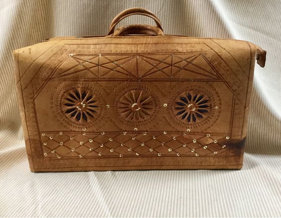 tooled leather suitcase