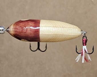 Handmade Cedar fishing lure. From scratch custom made lure. Topwater Walk-the-dog action. Handmade Cedar fishing lure. From scratch custom made lure. Topwater Walk-the-dog action.