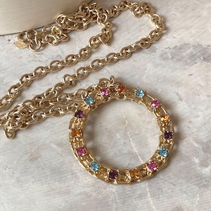Vintage Sarah Coventry Colorful Rhinestone Circle Pendant, PICADILLY CIRCLE 1974 Gold Tone Necklace, Multicolored Glass Statement Pendant