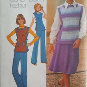 May include: A vintage sewing pattern featuring three different styles of women's clothing. The pattern includes a blue and white striped waistcoat with a purple skirt, a blue jumpsuit with a tie at the waist, and a brown and orange apron with blue trousers.
