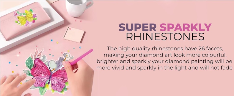 May include: A pink butterfly diamond painting in progress, with a pink stylus and scattered rhinestones. A pink pencil case with a butterfly design and the text "SUPER SPARKLY RHINESTONES" are also visible.