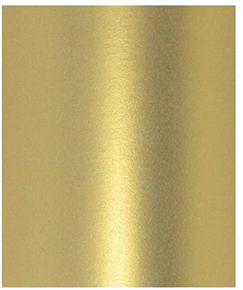 May include: A sheet of gold metallic paper with a subtle shimmer.