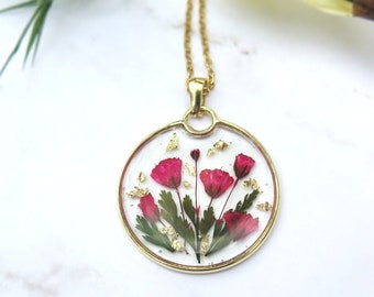 Gold frame circle necklace with red pressed flowers