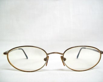 Vintage Luxottica Titanium Metal Small Oval Reading Glasses with Spring Hinges