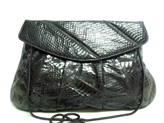 Original by Caprice Abstract Black Python Clutch … - image 1