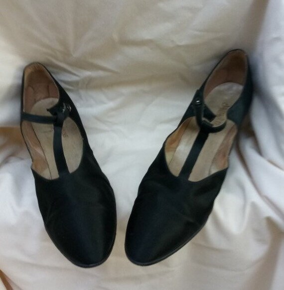 Black satin T strap shoes