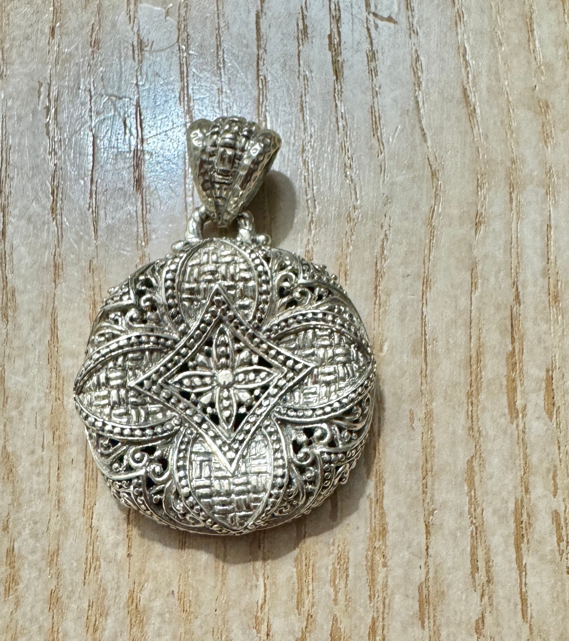 Oval Keepsake Locket Photo and Memory Keeper Sterling Silver and Diamond Accent Oval Keepsake Locket Photo and Memory Keeper Sterling Silver and Diamond Accent