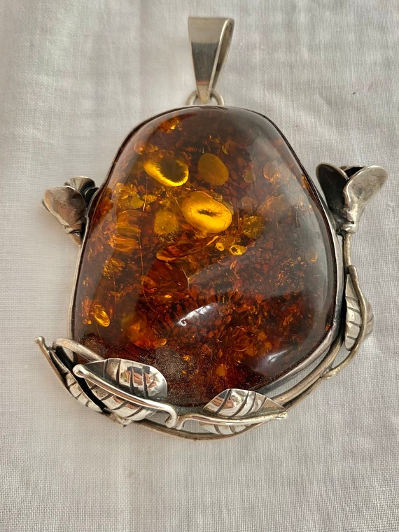 Sterling Silver Multi Amber Framed Pendants Sterling Silver Multi Amber Framed Pendants