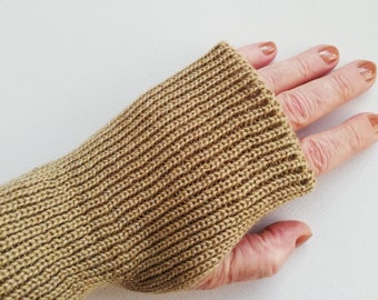 Cuffs, wrist warmers with thumb hole knitted in merino wool