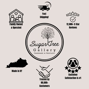May include: Black and white logo for Sugar Tree Gallery, a family-owned and operated business that makes handmade items in Kentucky. The logo features a stylized tree with a circle around it and the text "Sugar Tree Gallery" and "Handmade in Kentucky".