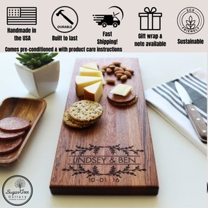 May include: Personalized wooden serving board with the names Lindsey & Ben and the date 10-01-16 engraved on it. The board is made of natural wood and has a rustic look. It is perfect for serving cheese, crackers, and other snacks.
