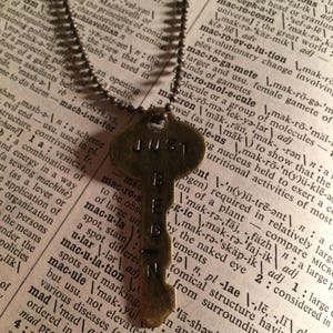 Just Begin necklaces. The "i" is going the wrong way to say, you don't have to  have it all together to "Just Begin!" Now go!