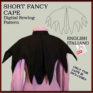 Può includere: Un mantello corto nero fantasia con un bordo a zig-zag. Il mantello è indossato sopra un maglione rosa. L'immagine include il testo "SHORT FANCY CAPE Digital Sewing Pattern" e "ONLY THE CAPE IS INCLUDED!"