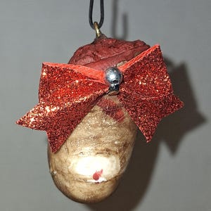 Severed Toe Ornament: Bloody Stump with Holiday Ribbon
