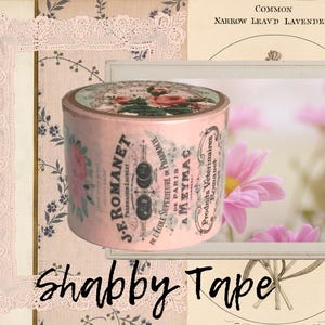 May include: A roll of pink shabby tape with floral and vintage label designs. The tape features the text "J.R. Romanet" and "Shabby Tape" in a decorative font. The background includes floral and lace elements.