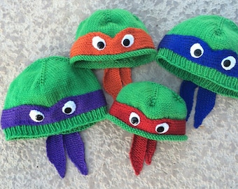 Hand-knit teenage mutant ninja turtle hat with ribbed or rolled bottom edge.  COWABUNGA!