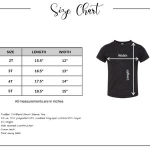 May include: Size chart for a toddler tri-blend short sleeve tee. The chart shows the length and width in inches for sizes 2T, 3T, 4T, and 5T. The tee is made of 50% polyester, 25% combed ring-spun cotton, and 25% rayon.