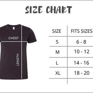May include: A black t-shirt with a size chart. The chart lists sizes S, M, L, and XL, with corresponding fit sizes ranging from 6-8 to 18-20. The text "SIZE CHART" is at the top.