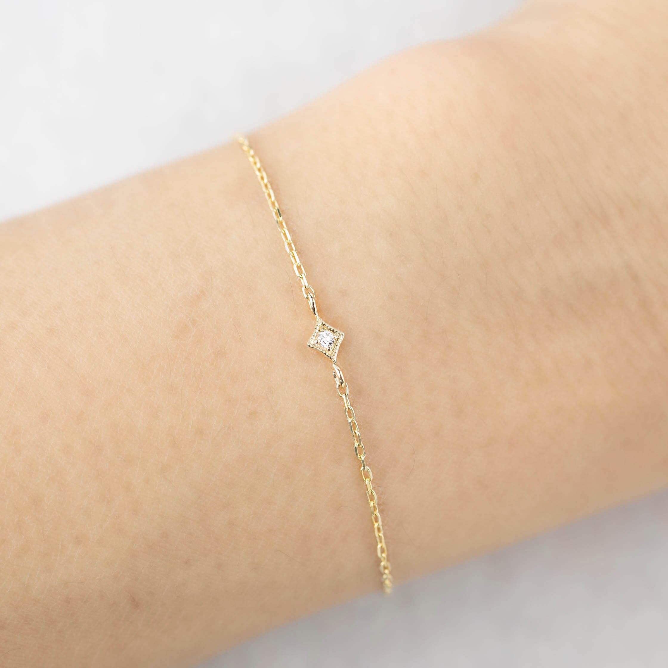Small gold bracelet folding bead